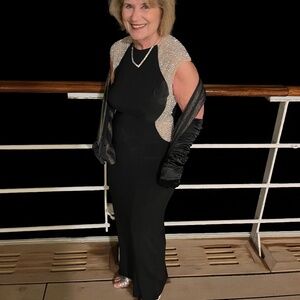 Formal black dress with sequin trim.